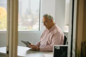 A PathNet pathologist signing out a case digitally on an iPad.