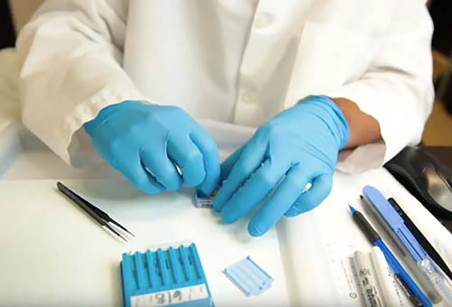 Digital Dermatologist Read out a case on an iPad